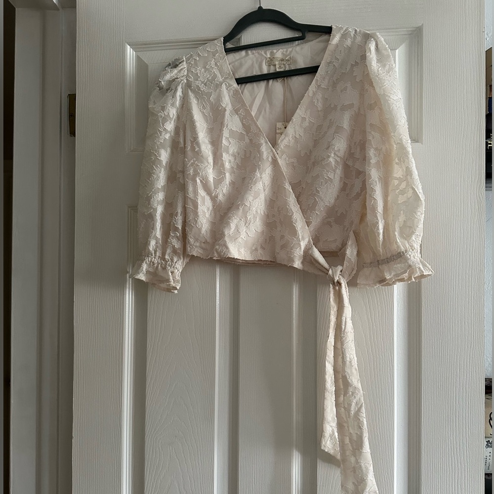 Cream v-neck lace blouse with front tie
